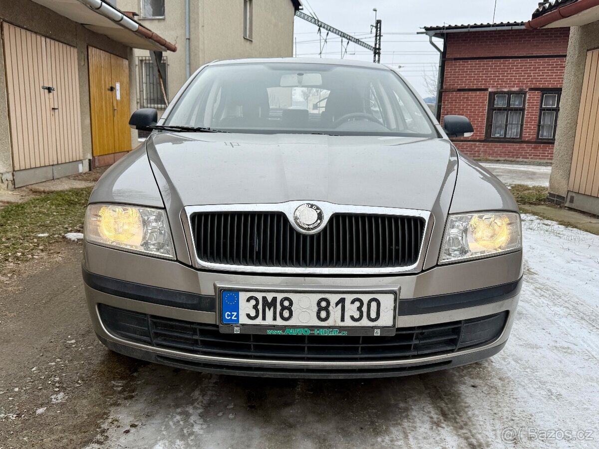 Škoda Octavia II 1.6 MPi - tažné + druhá sada kol