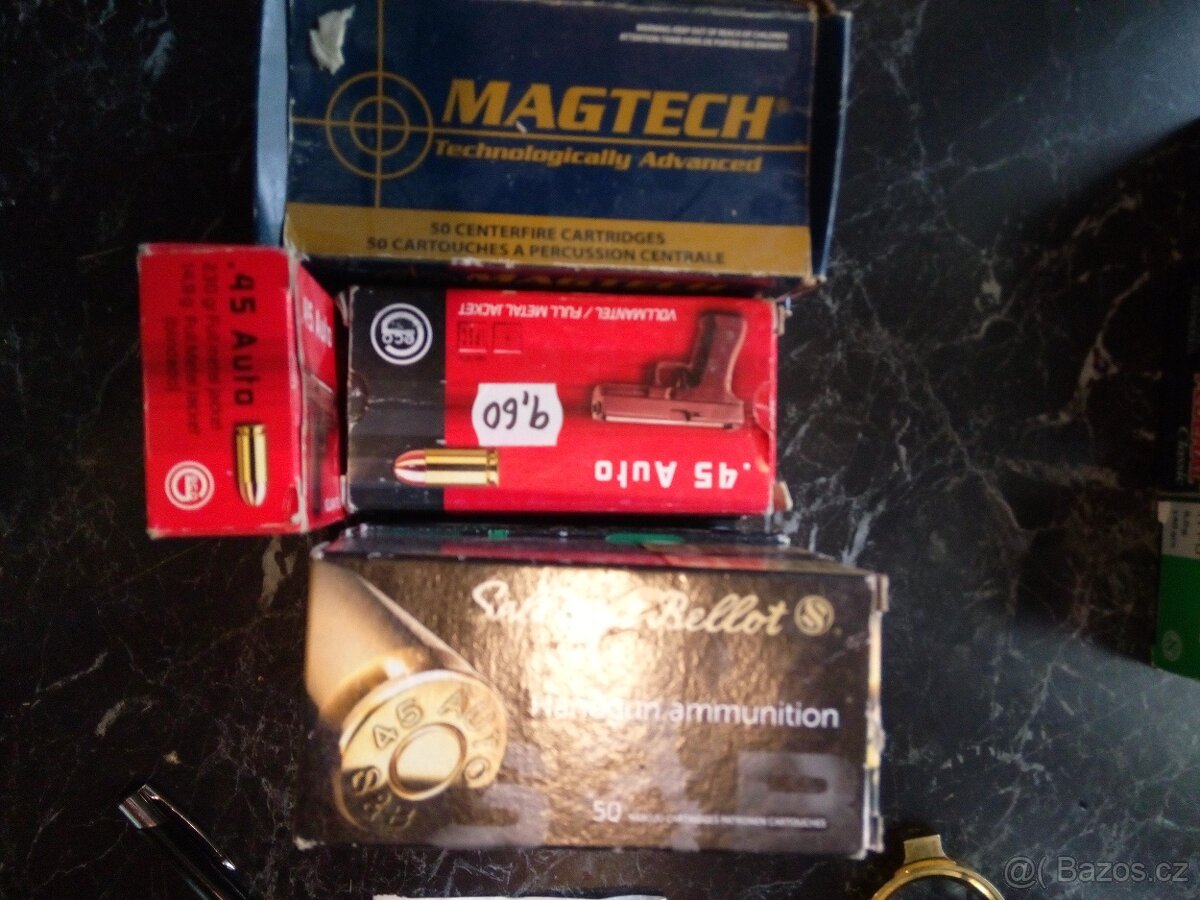 45ACP,nábojnice 1x vystřelené v krabickach