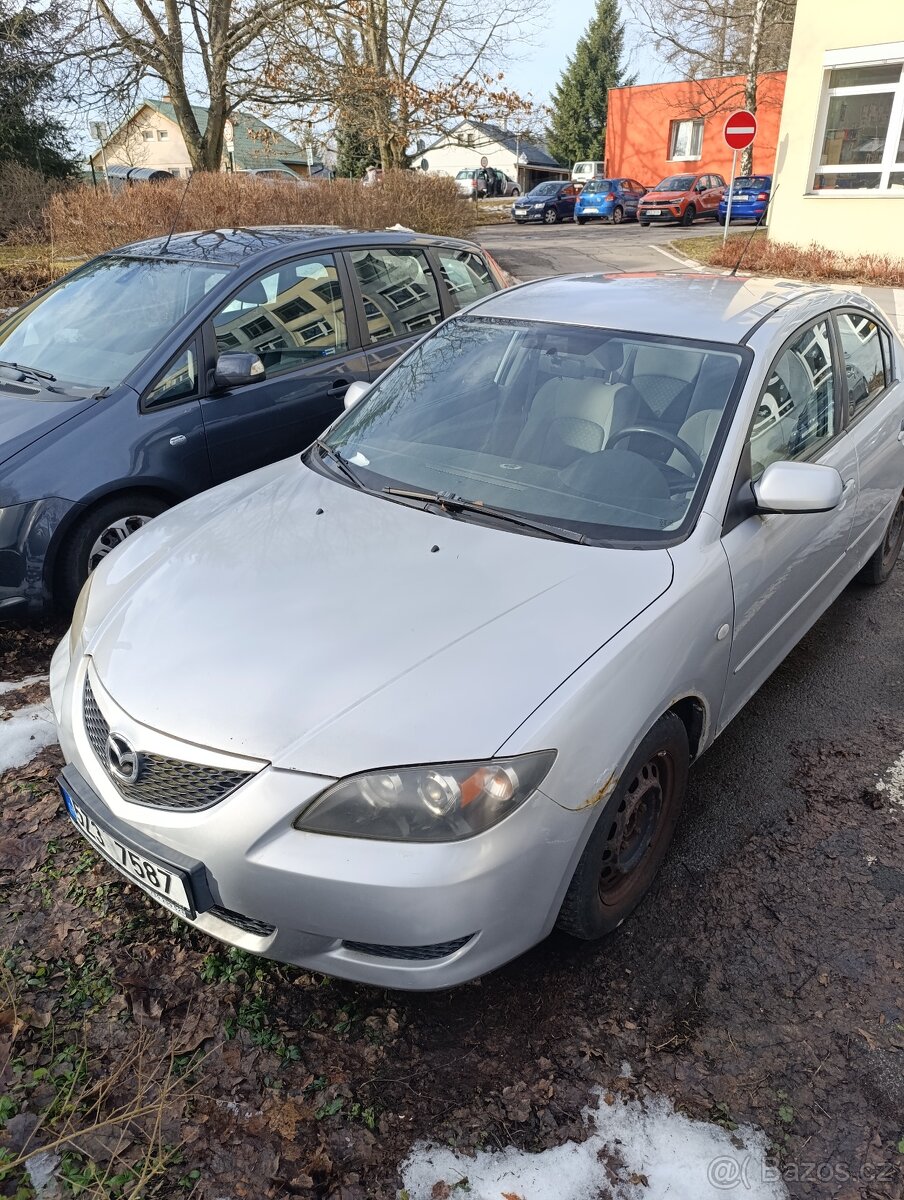 Mazda 3, 2004,1,6 77 kW, 146000 km