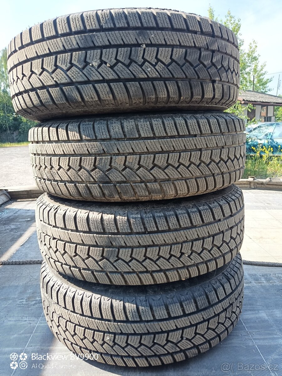 Zimní pneu 195/65 R15 na disku ŠKODA OCTAVIA 5X100.