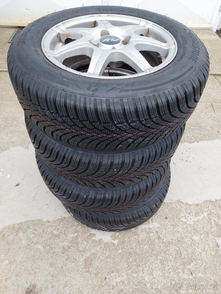 Alu + nové zimní pneu  Bridgestone Blizzak LM005 185/65R14