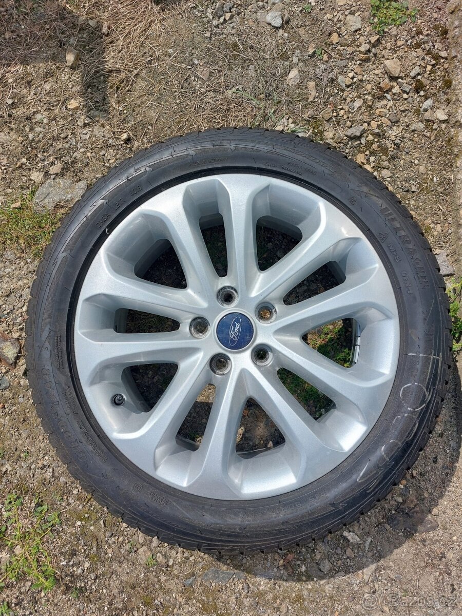 (č.50) Originální 17" Alu kola Ford se zimními pneu