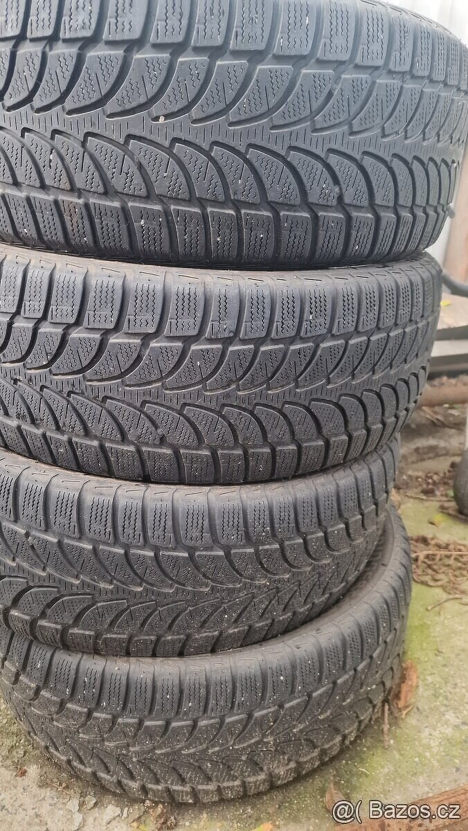 Prodám 4 zimní pneu BRIDGESTONE 235/55/18,vzorek6,5mm,cena j