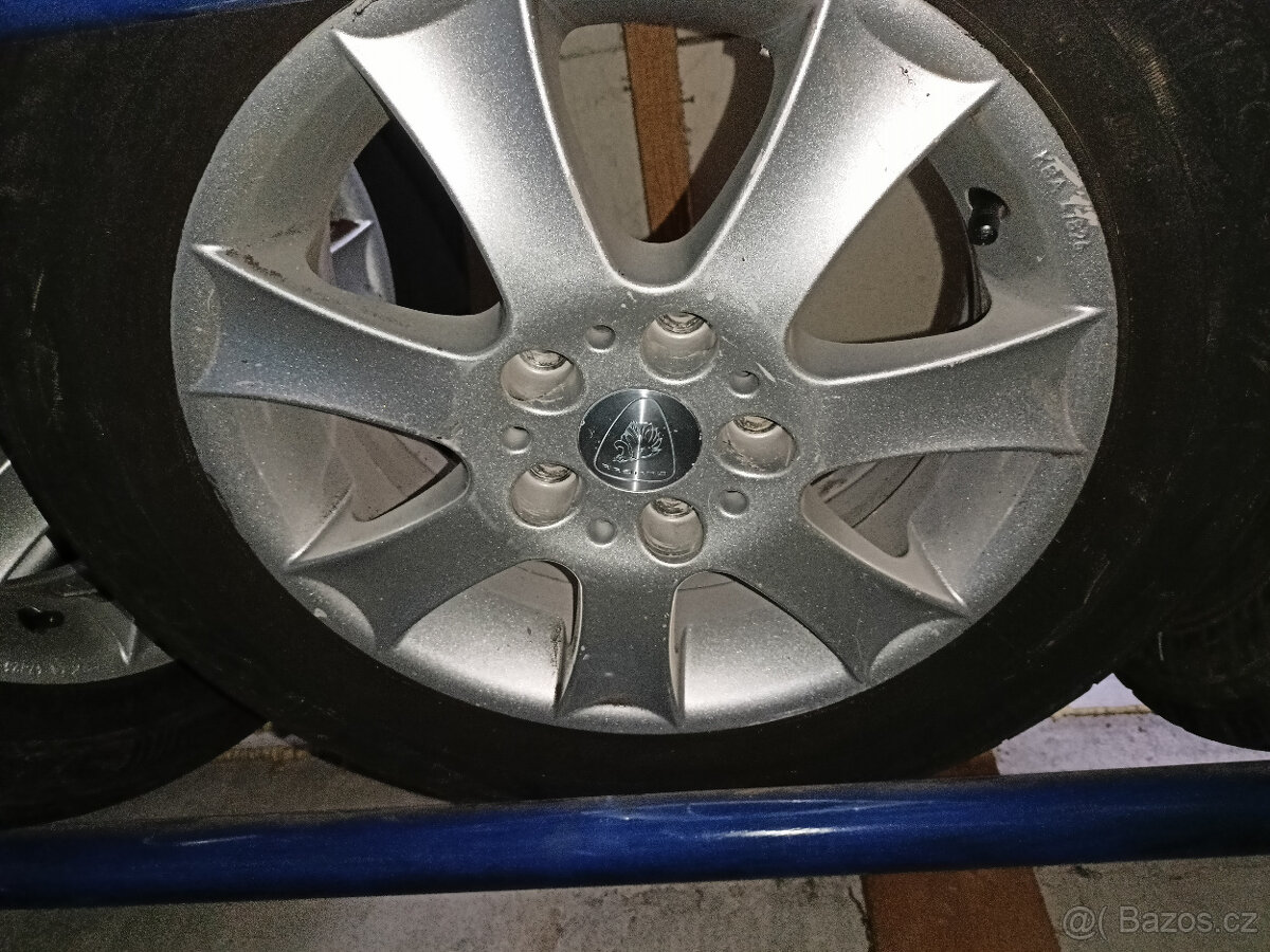 SLEVA VW Touran alu kola 15" sada