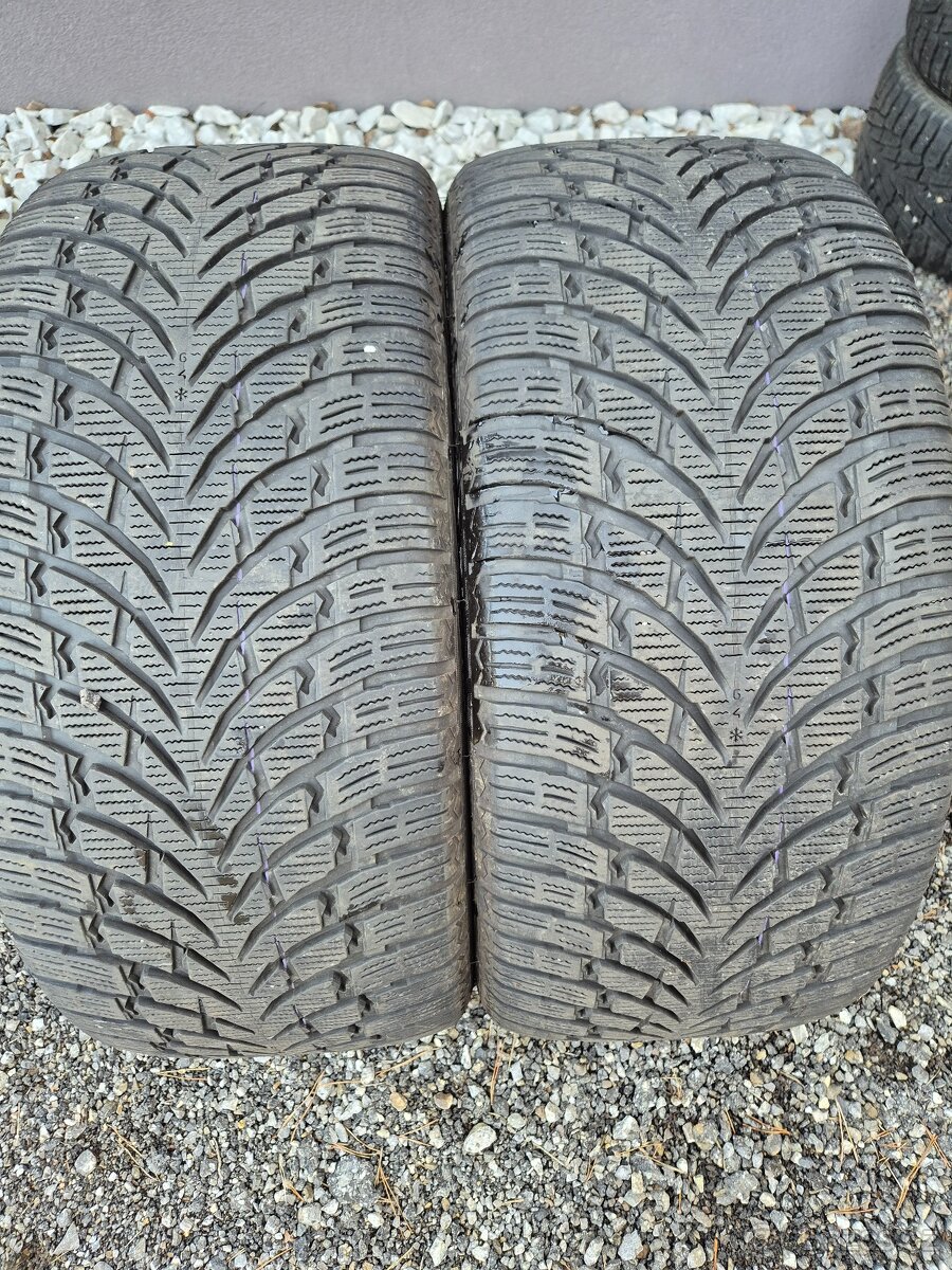 265/40 r21