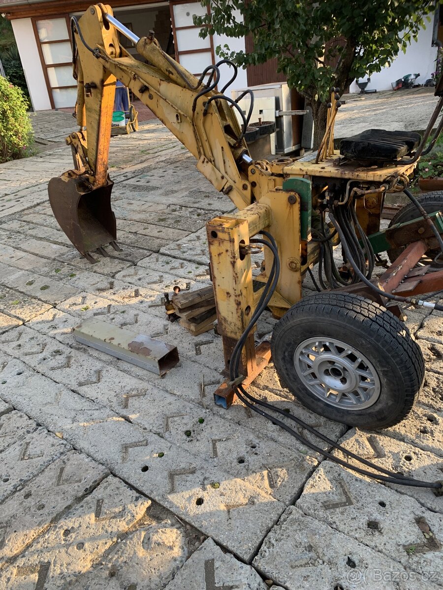 Podkop na UNC-080, nebo tažený a hnaný za traktor.