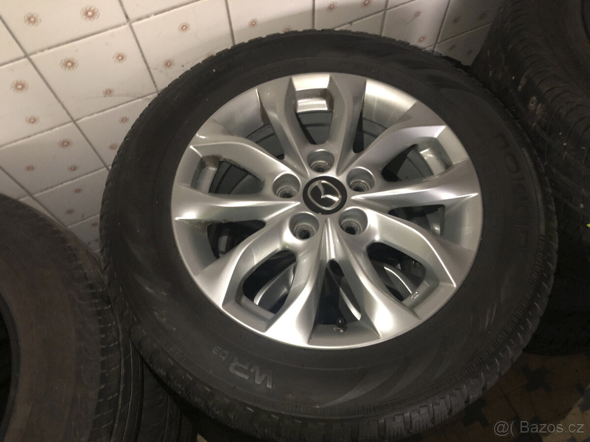 komplet alu kola a zimní pne Mazda orig. 215/60R16