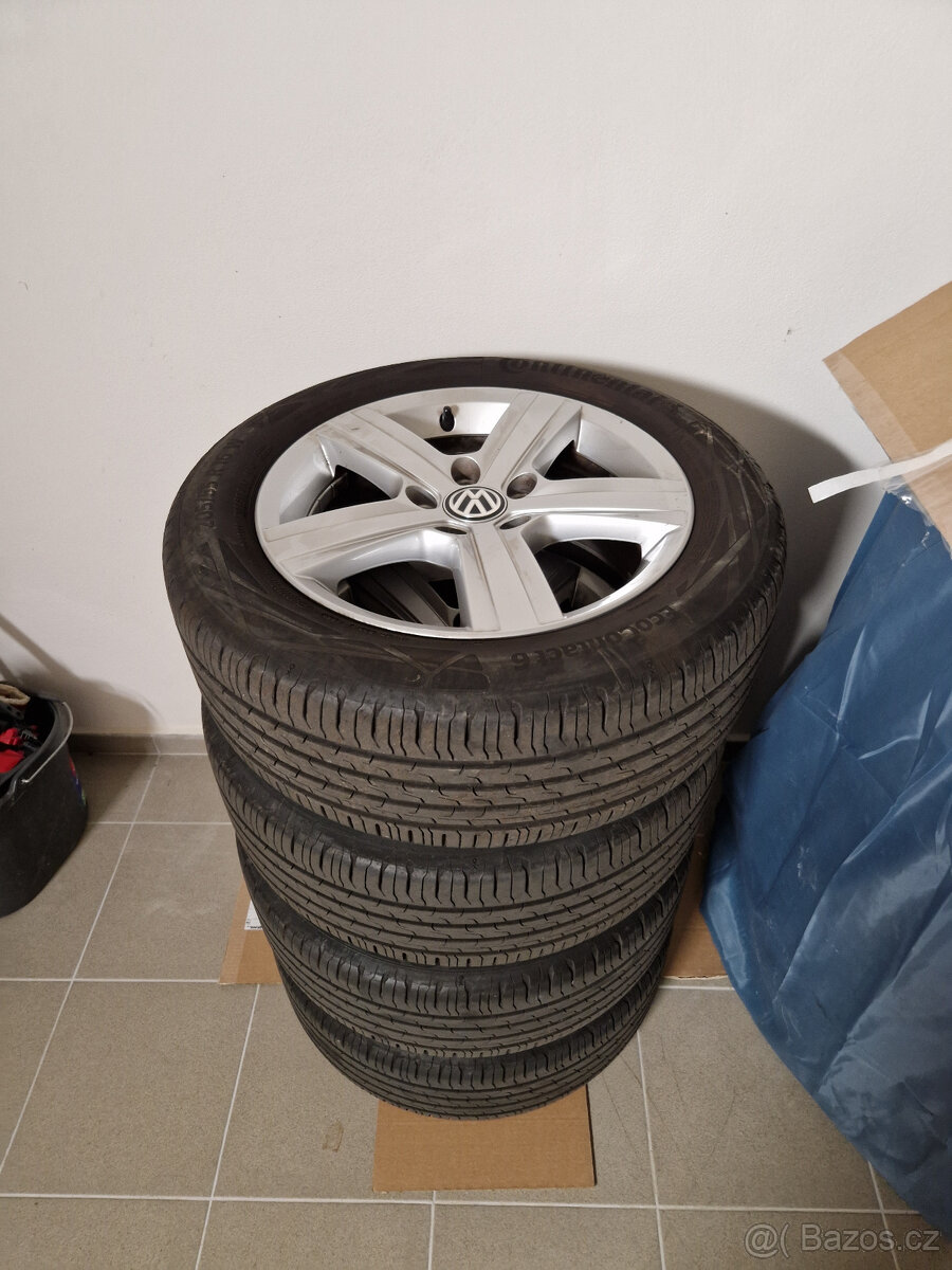 ALU kola s pneu 205/55 R16 6,5Jx16H2 ET46, ORIGO VW Dover