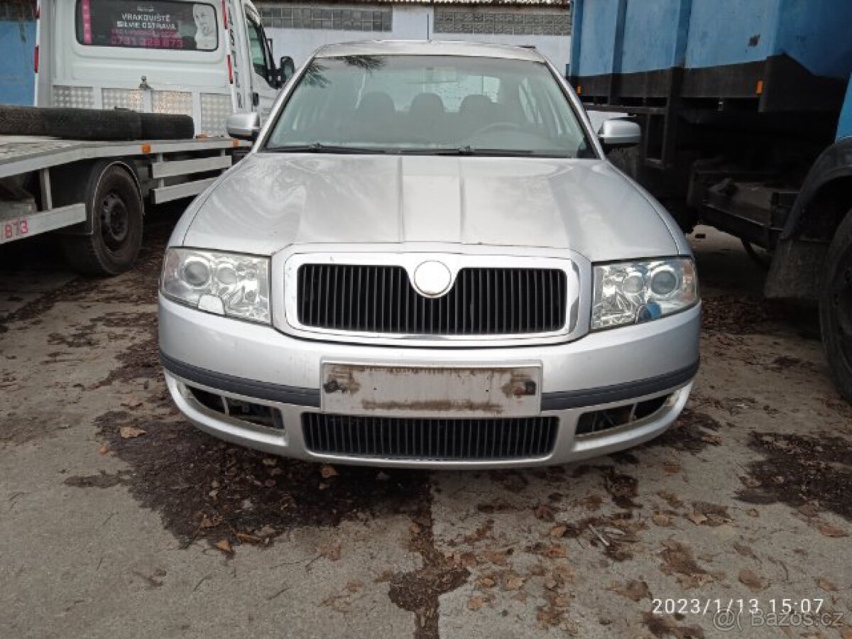 prodám světlomety xenony Škoda Superb tel 731328873