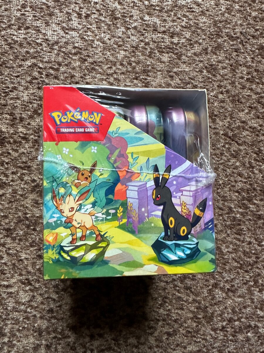 Pokemon prismatic evolutions sealed mini tin display