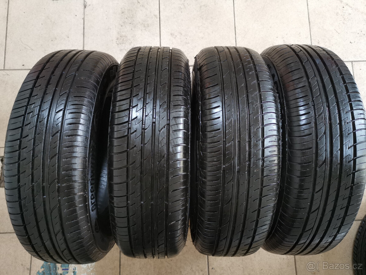 4 kusy zánovní letní pneu 185/70R14 88H, vše za 1600 Kč.