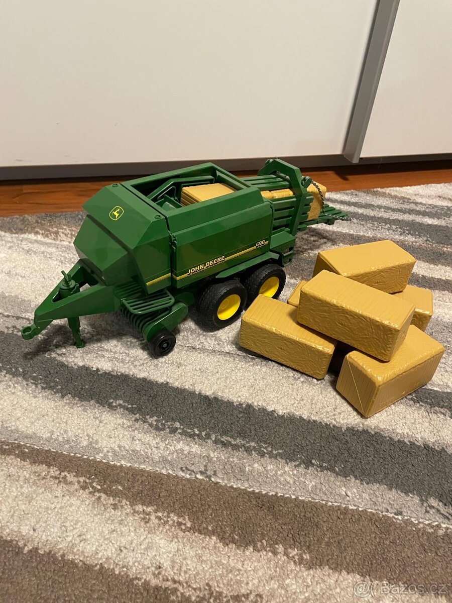 Prodám hračku Bruder - Balíkovačka John Deere