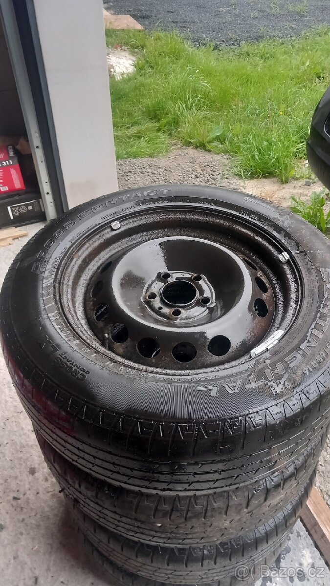 Plechové disky s pneu volvo r16 včetně originál poklic