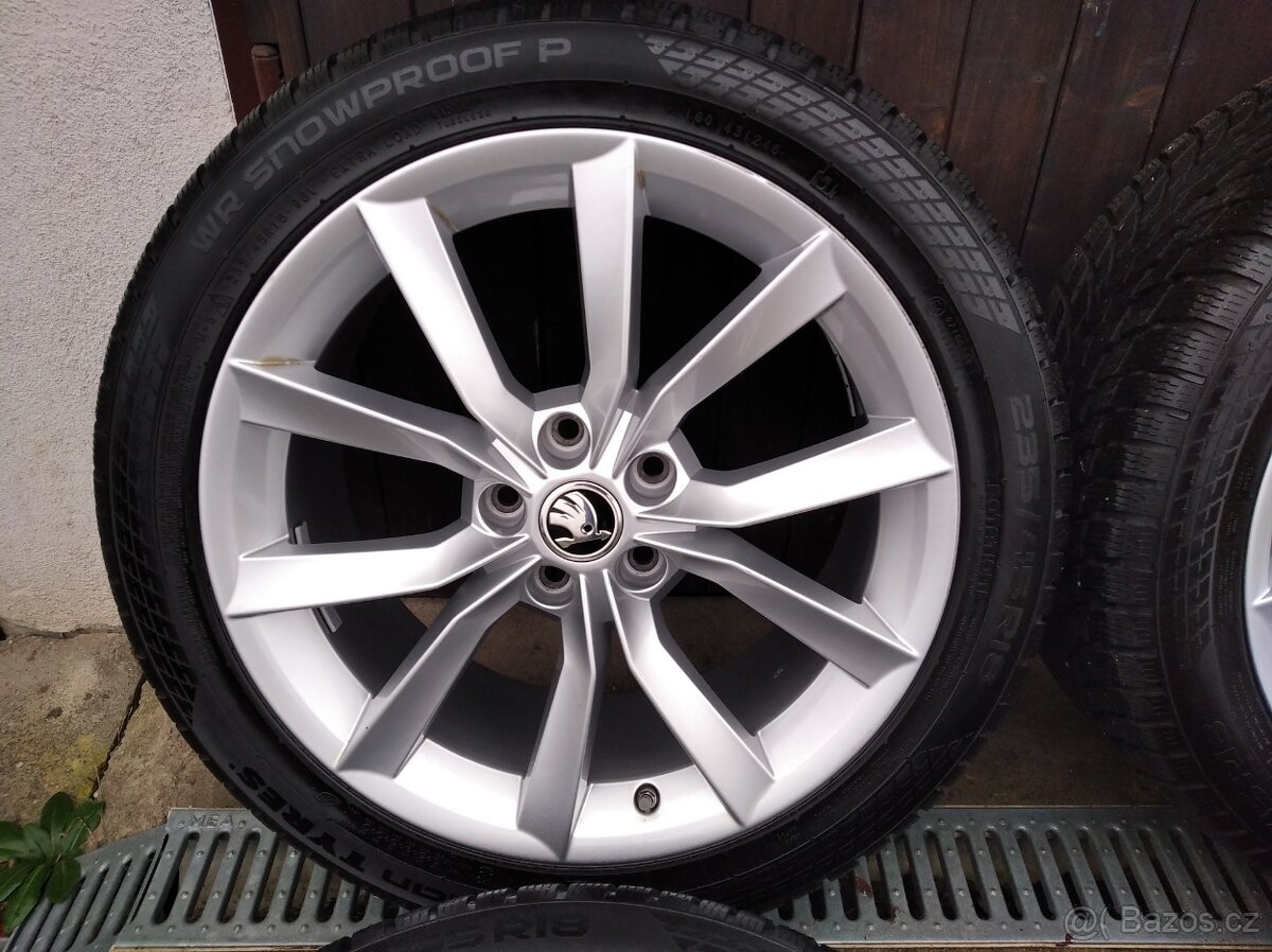 Zánovní zimní alu sada Škoda Superb III 18" 5x112