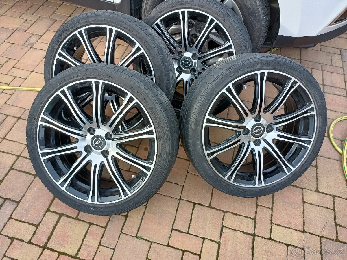 Alu kola Opel Milano 7Jx17H2 4x100 ET36+ pneu