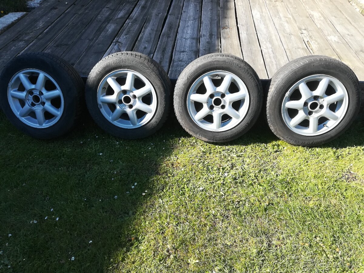 Prodám alu kola i s pneu 165/70 R14 rozteč 4x100