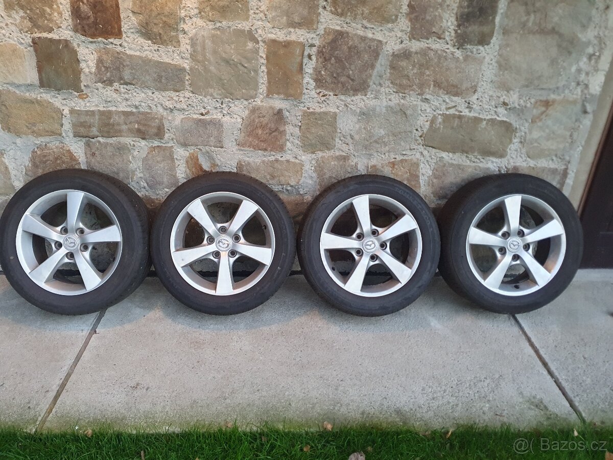 Alu kola originál Mazda 3 5x114,3 ET52,5