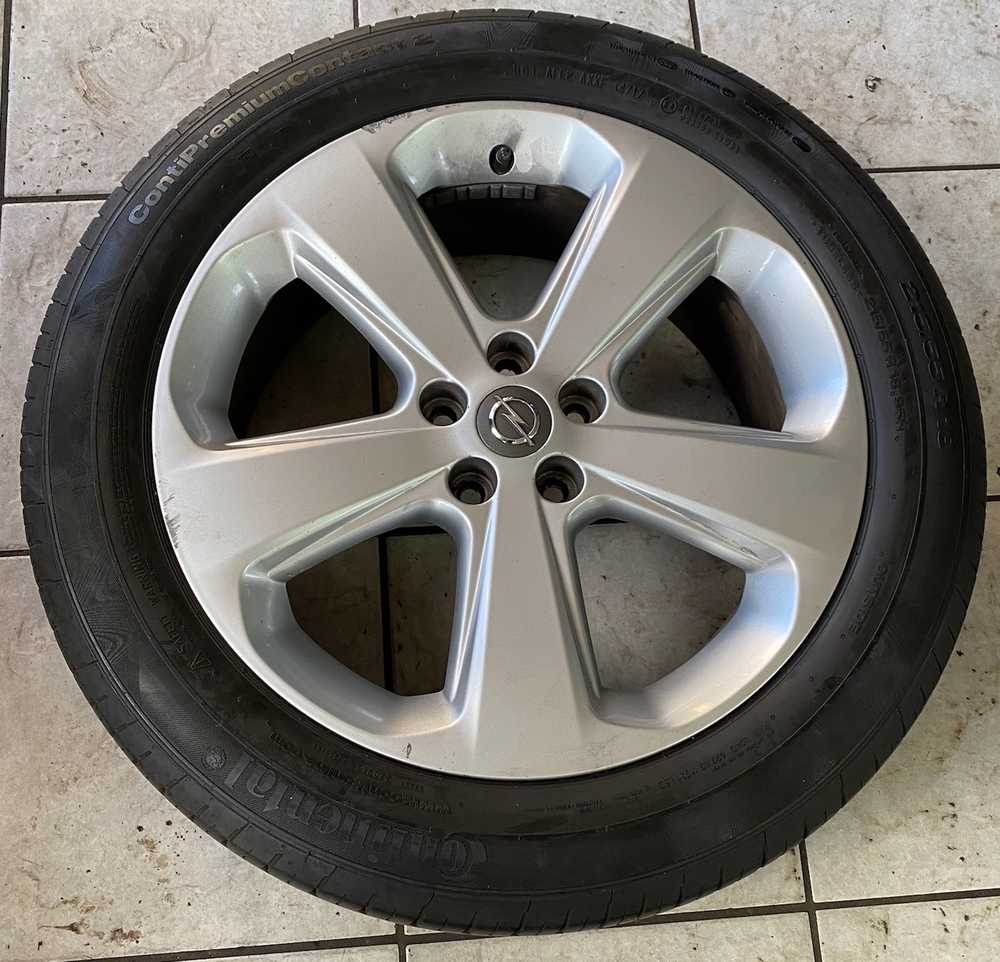 Sada alu OPEL 7x18" 5x105x56.5 ET38 a Continental