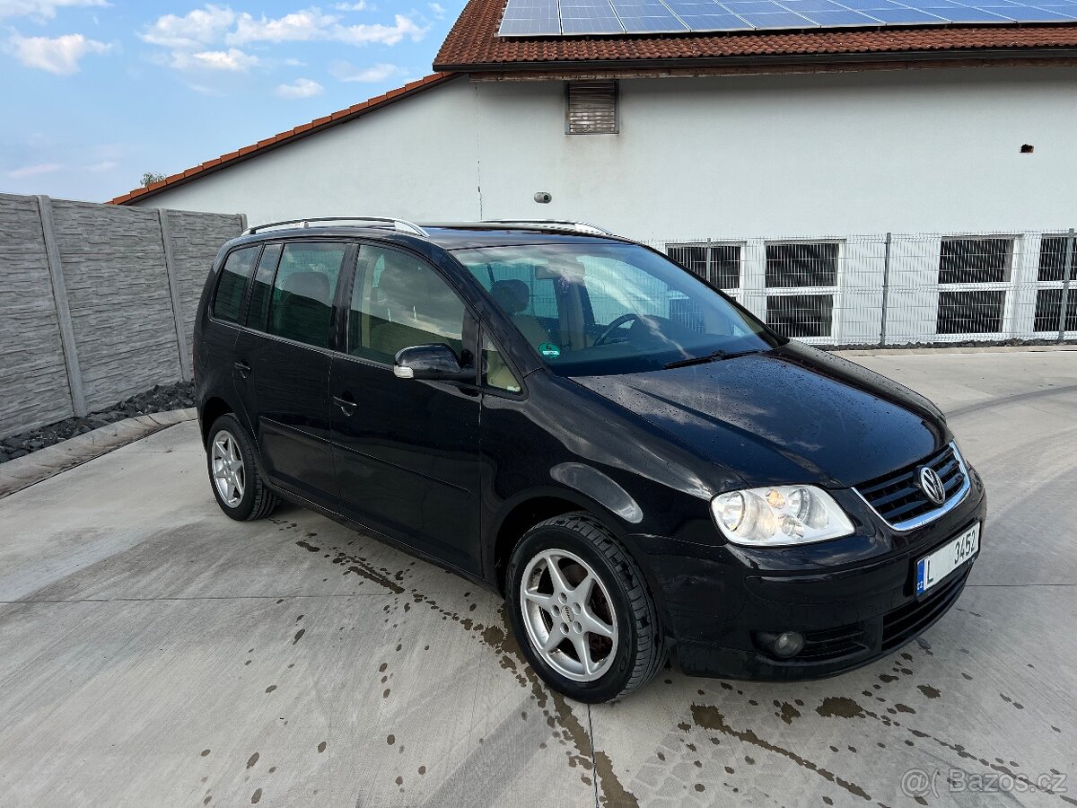 Touran 2.0tdi 230 t.km 7 místné