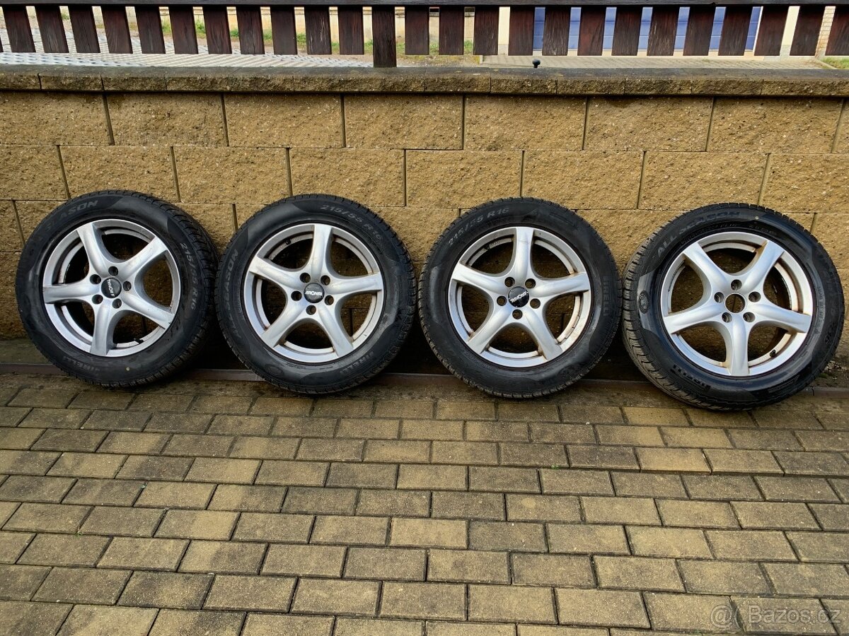 ALU kola Ronal Ford Mondeo celoroční pneu 215/55 R16