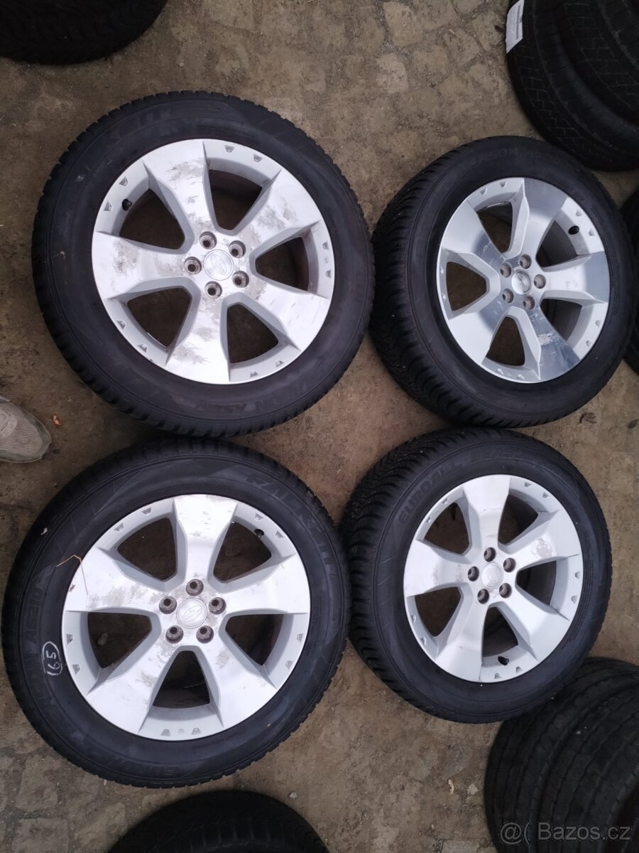 al. disky 5x100 R17 SUBARU original