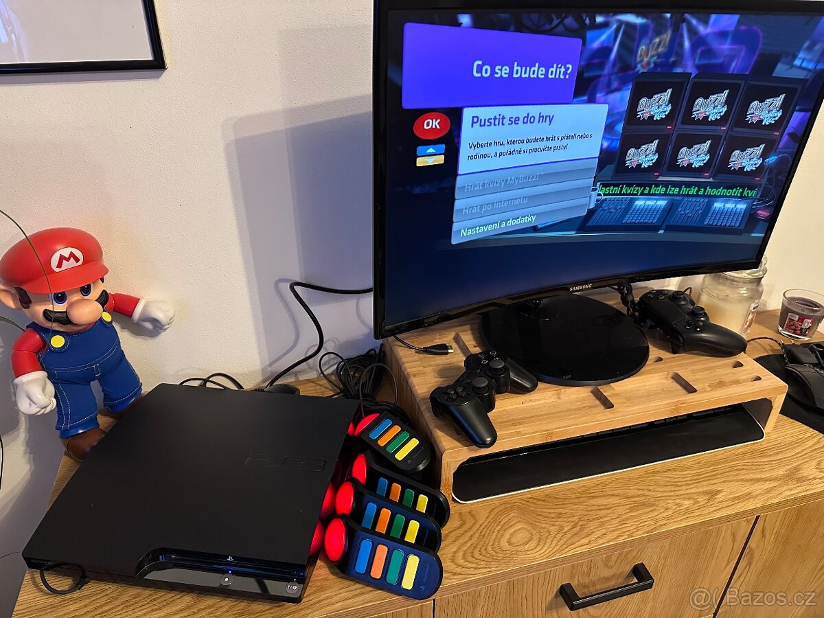 Playstation 3 + ovladac + hry (Buzz CZ)