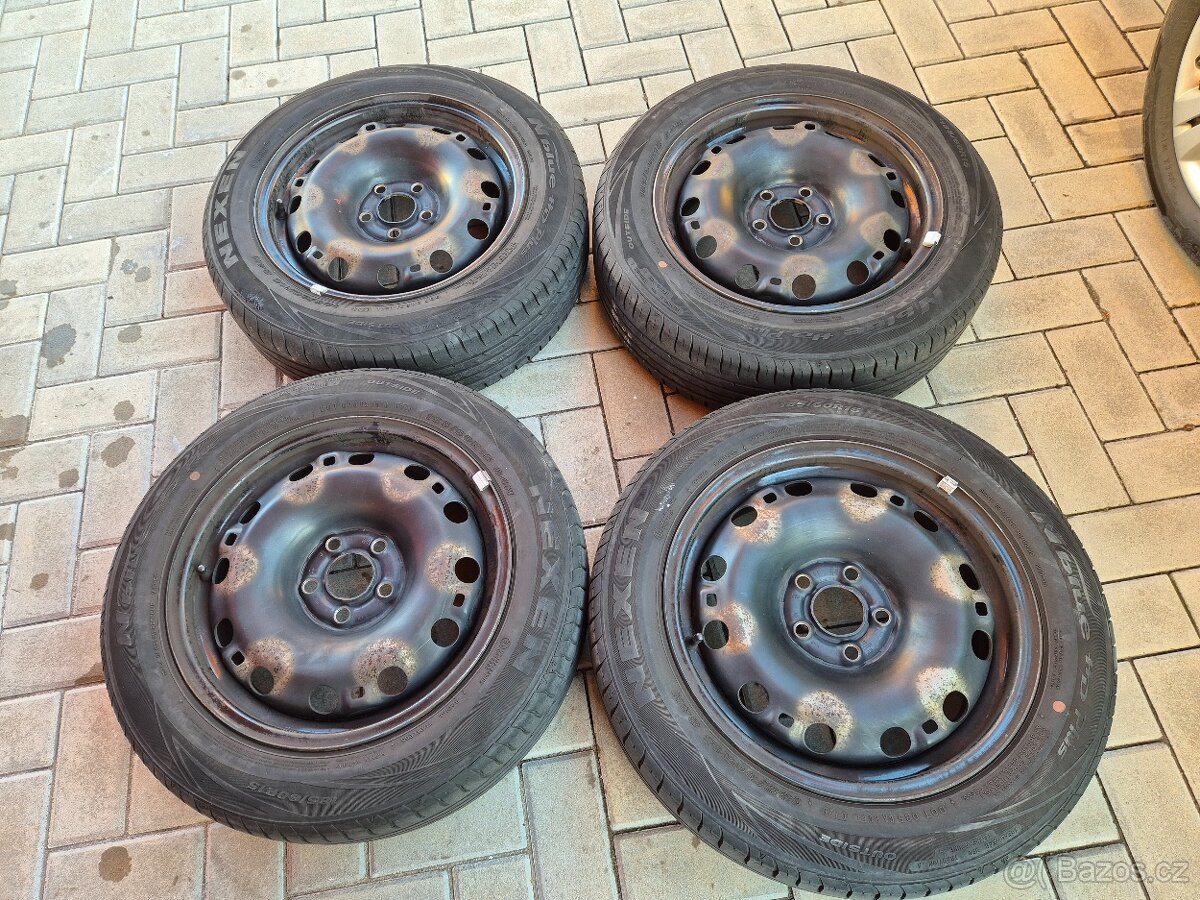 Sada disků 5x100 + letní pneu NEXEN 185/60 R15 z FABIA III