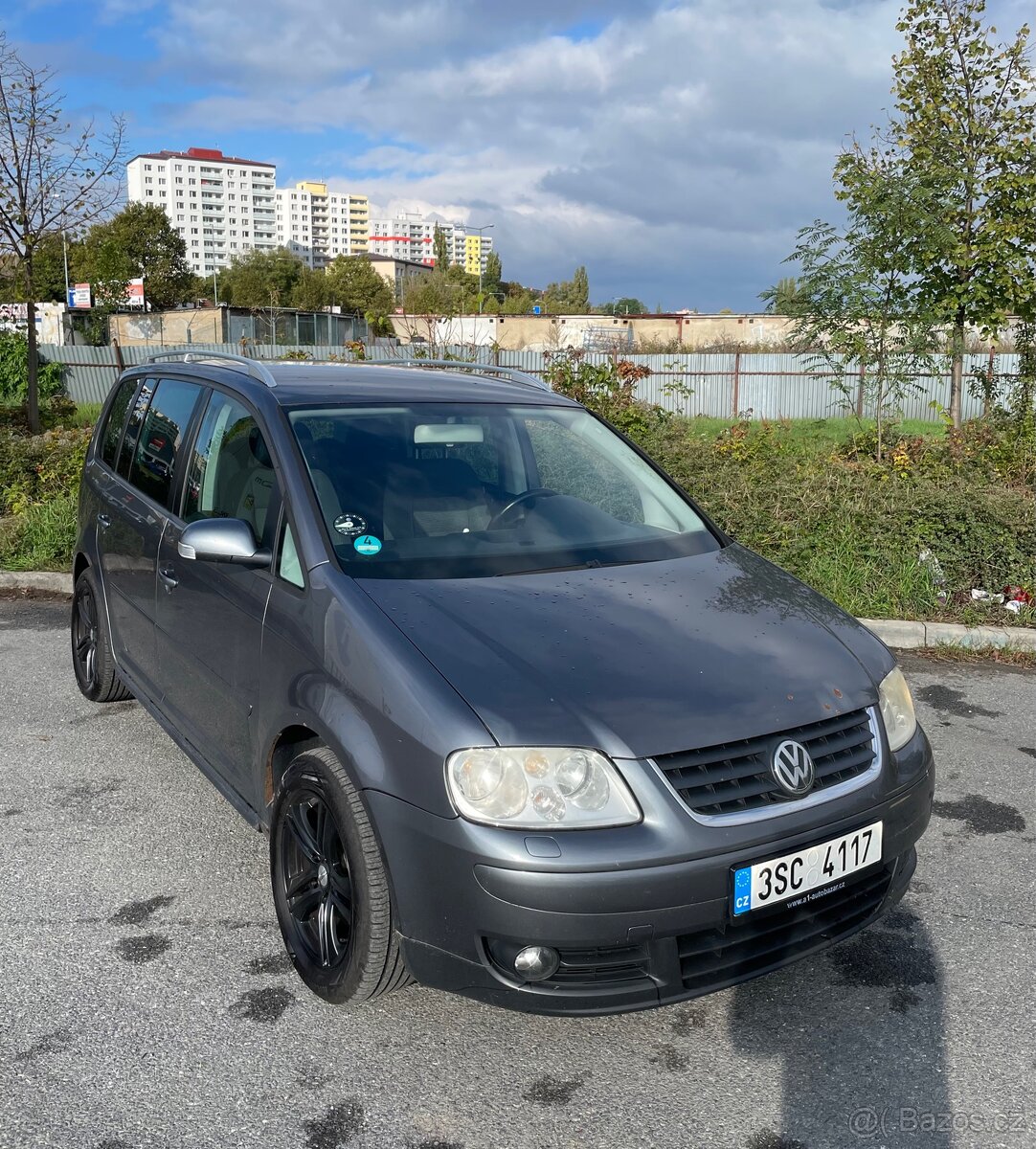 VW Touran 1,9Tdi /77kw/ 7míst/ DSG/ tažné