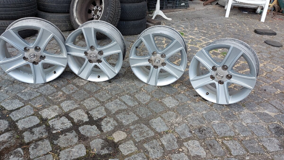 16" SADA ALU DISKŮ MAZDA 7JX16 ET55