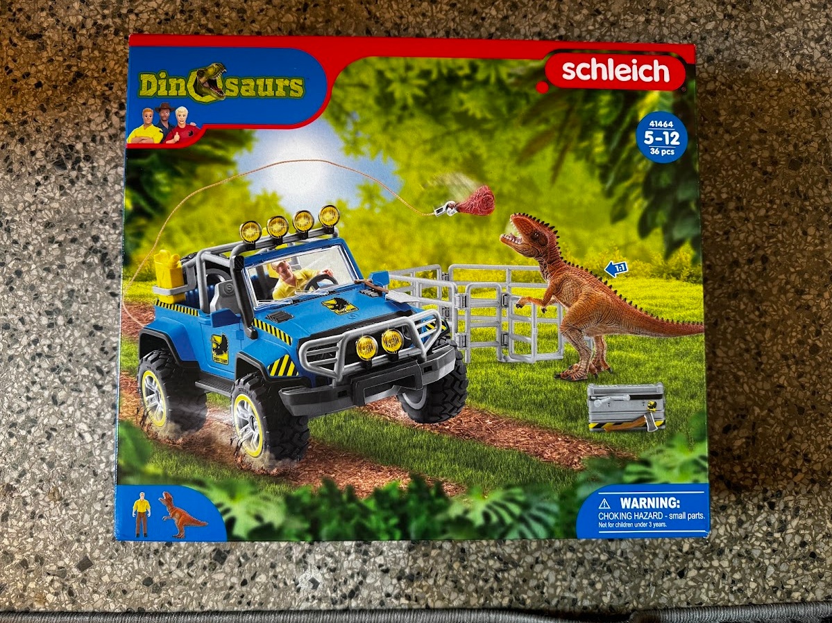 Schleich Terénní vůz s venkovním výběhem pro dinosaura 41464