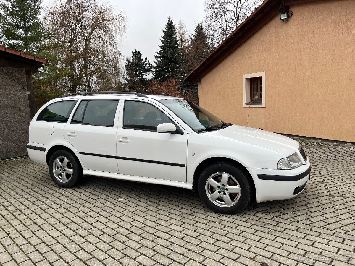 Škoda Octavia Combi 1.9 TDI 81 kw, r.v.2003,zimní+letni pneu