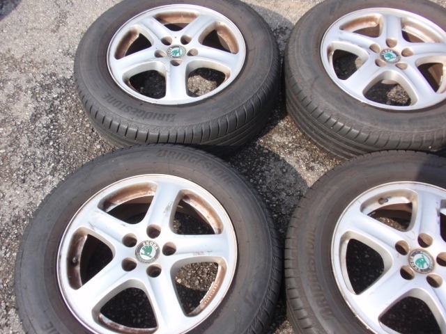 Alu kola Octavia 5x100 R15 s pneu Bridgestone