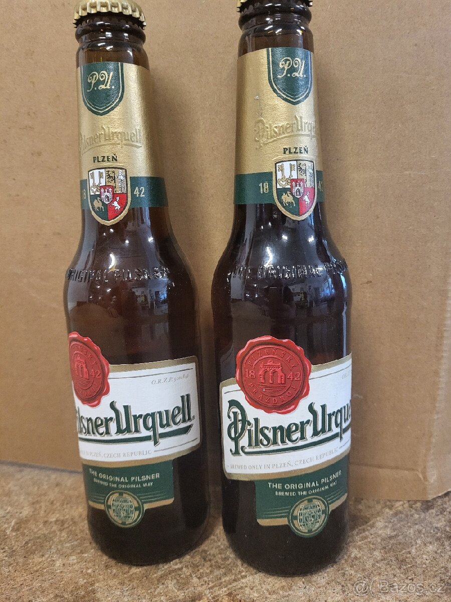 Pilsner Urquell 0.33 litru .