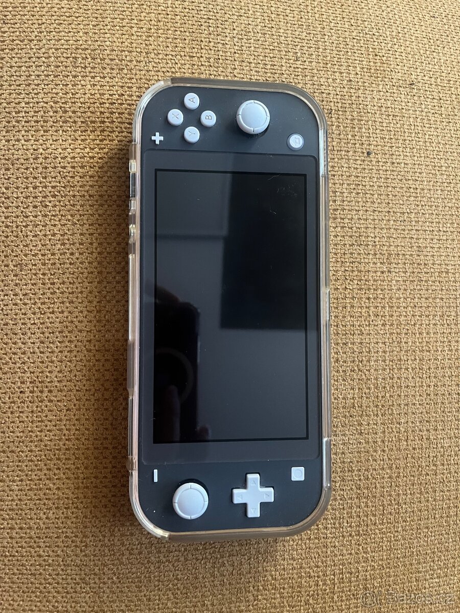 Nintendo switch lite +14 her v ceně