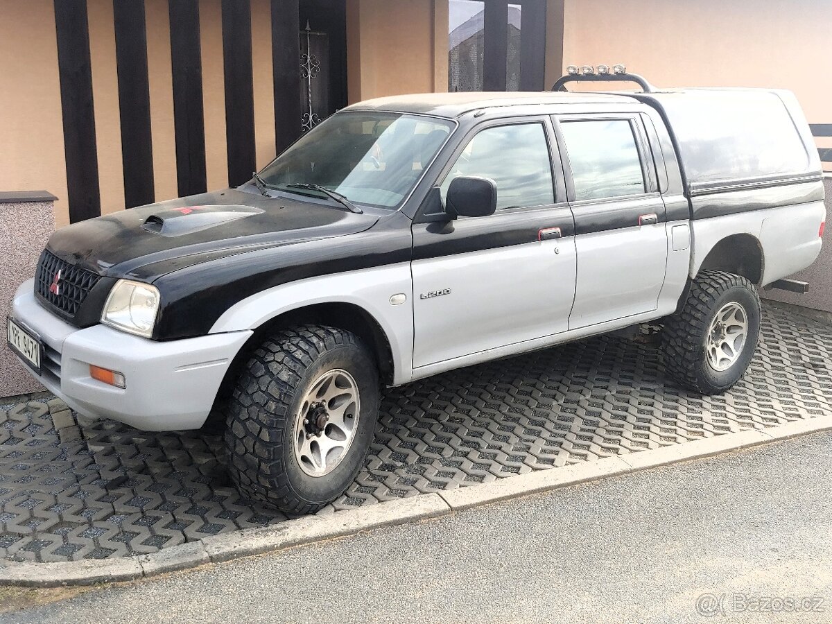 Mitsubishi L200 - propadená STK.