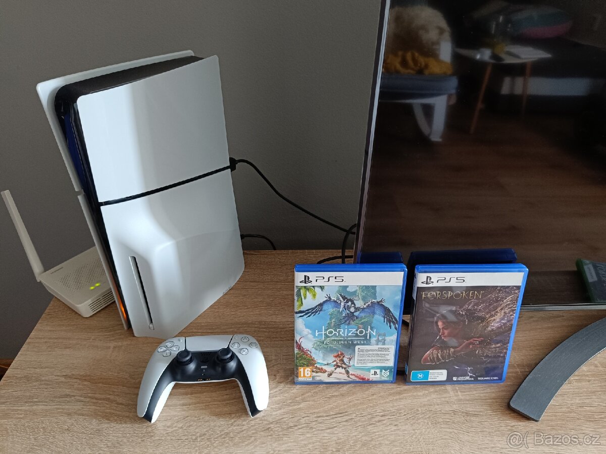 PS5 Slim s mechanickou + dvě hry - záruka