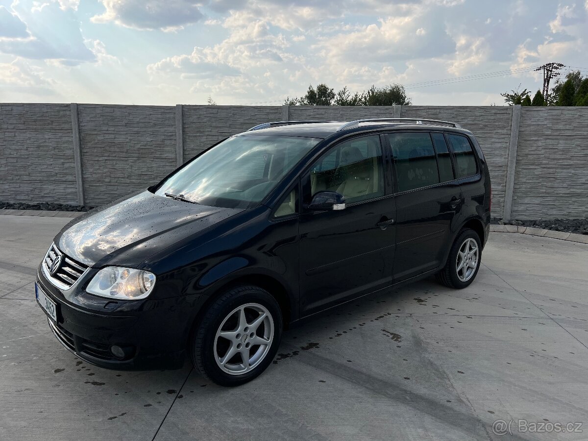 Touran 2.0 tdi 231 t.km 7 míst