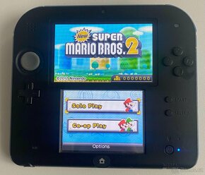 Nintendo 2DS + 64gb - 10