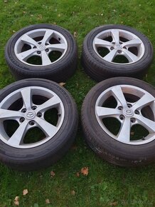 Alu kola originál Mazda 3 5x114,3 ET52,5 - 10