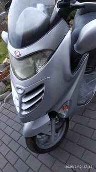 Kymco Grand Dink 125 - 11