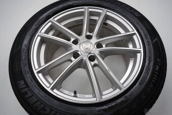 Opel Insignia - 17" alu kola - Letní pneu - 11