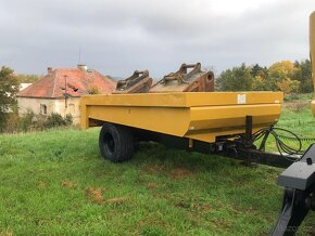 Kolové rypadlo Caterpillar M316F - 12