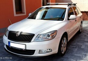 NÁDHERNÁ ŠKODA OCTAVIA COMBI 2 FACELIFT 1.6 D  MODEL - 2012 - 12