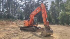 Pásový bagr Doosan DX140 - 12