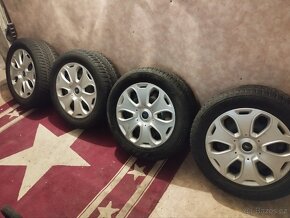 Zimní kola 5x108 235/55 R17 - 13