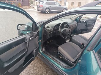 Opel Astra 1.6i 74kw najeto pouhých 100 tis.km - 14