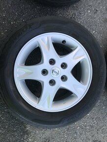 Alu kola Nissan Almera Tino 195/65 R15 - 14