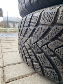 Zimní kola 225/65 R16 + chrysler alu disky - 14