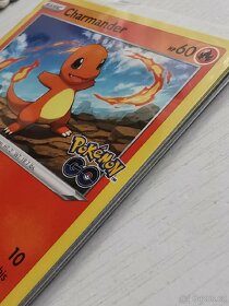 Balíček 11ks(12ks) originálních Pokémon karet.

 - 15