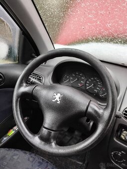 Peugeot 206 1.4i - 16